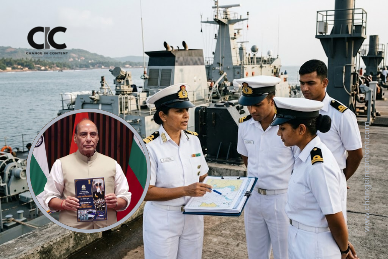 A woman Indian Coast Guard officer reviews an operational briefing with colleagues beside a maritime patrol vessel.