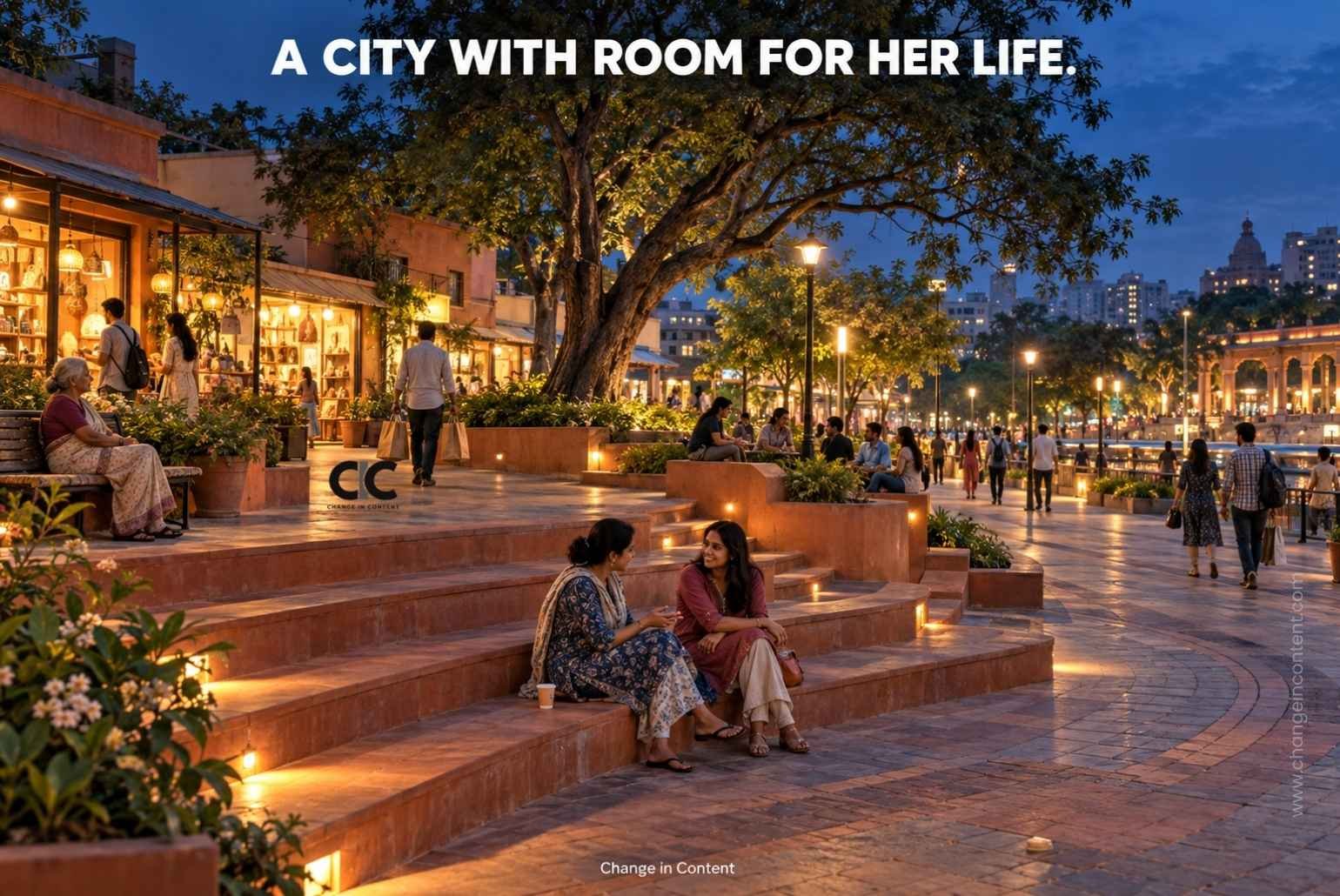 Imagined Indian public square at dusk, with women sitting and talking on terracotta steps and neighbours using a tree-lined walkway.
