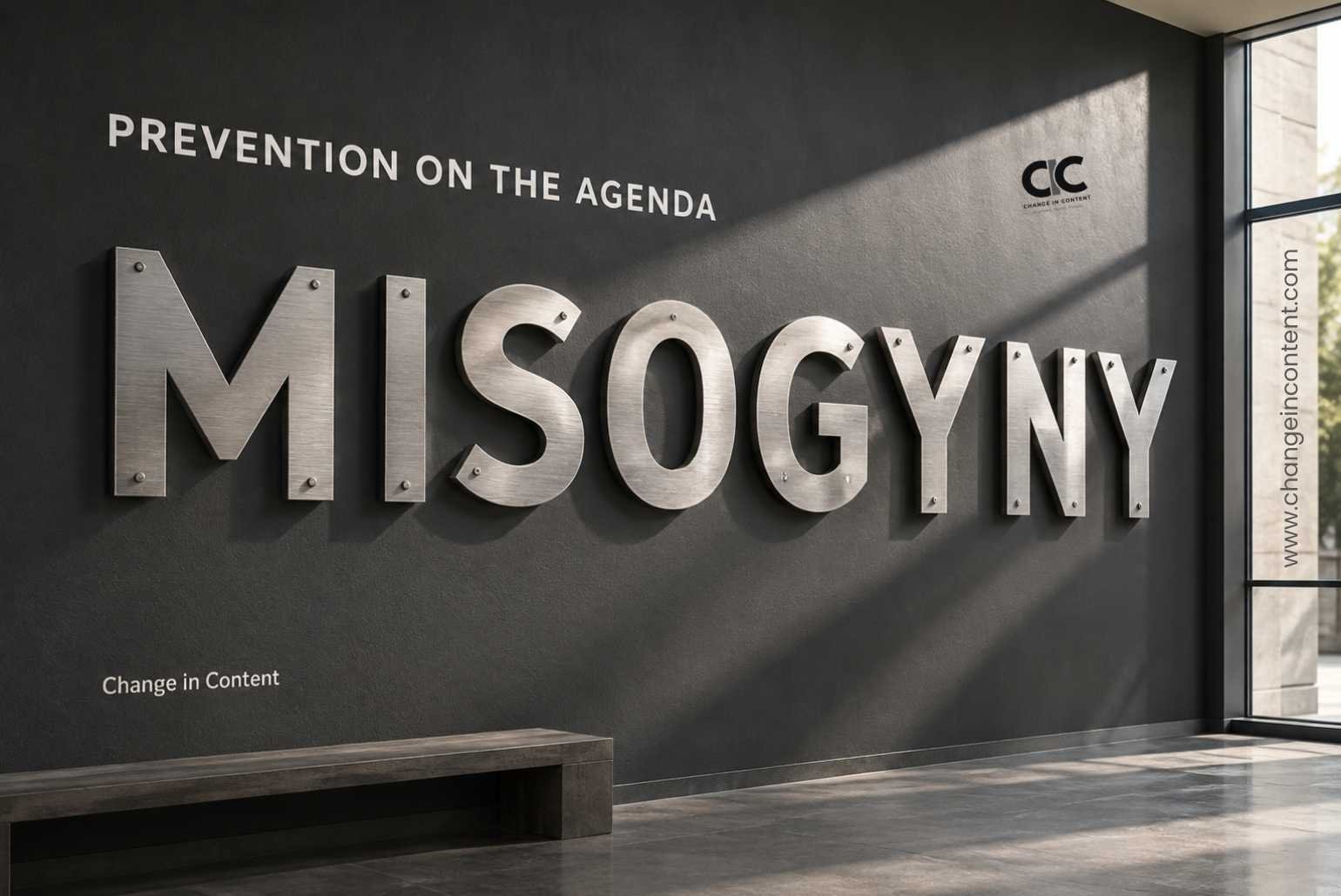 Conceptual image of the word “Misogyny” illuminated on a charcoal wall, with the headline “Prevention on the agenda”.